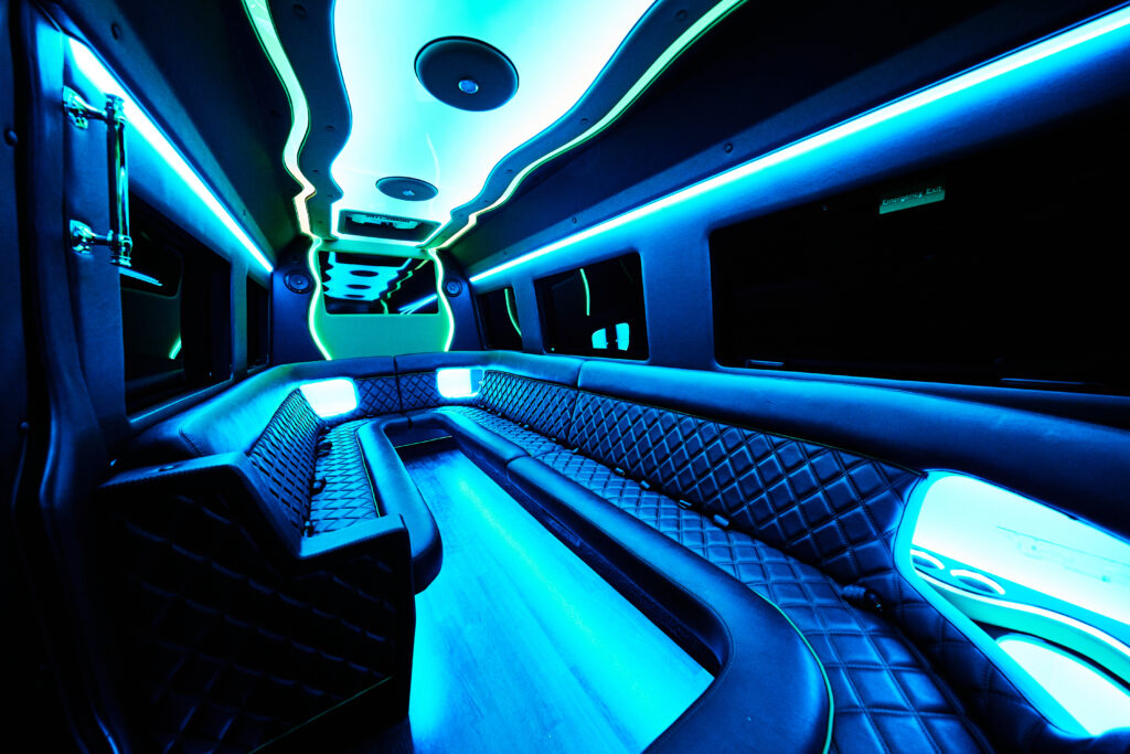 inside of a party bus with blue neon lights