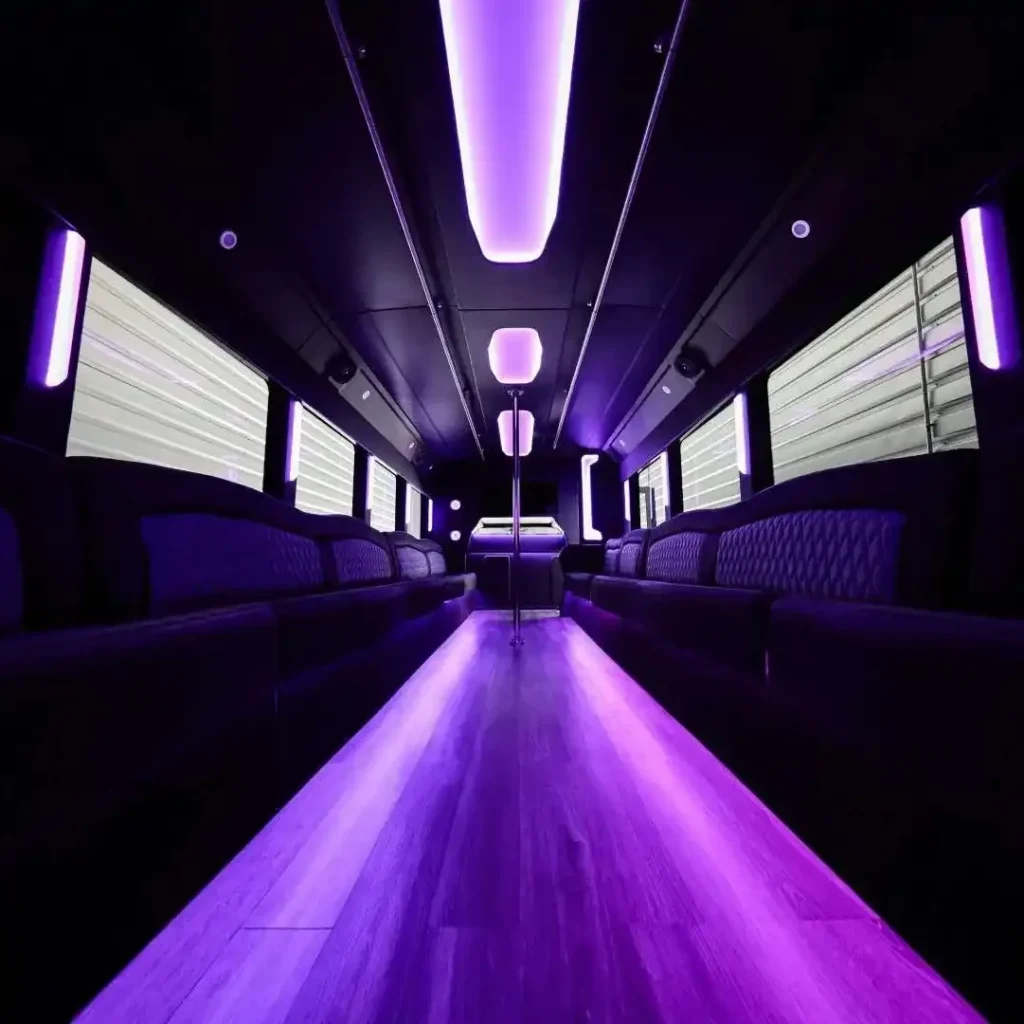 25 Passenger Bus inside with bight purple neon lights